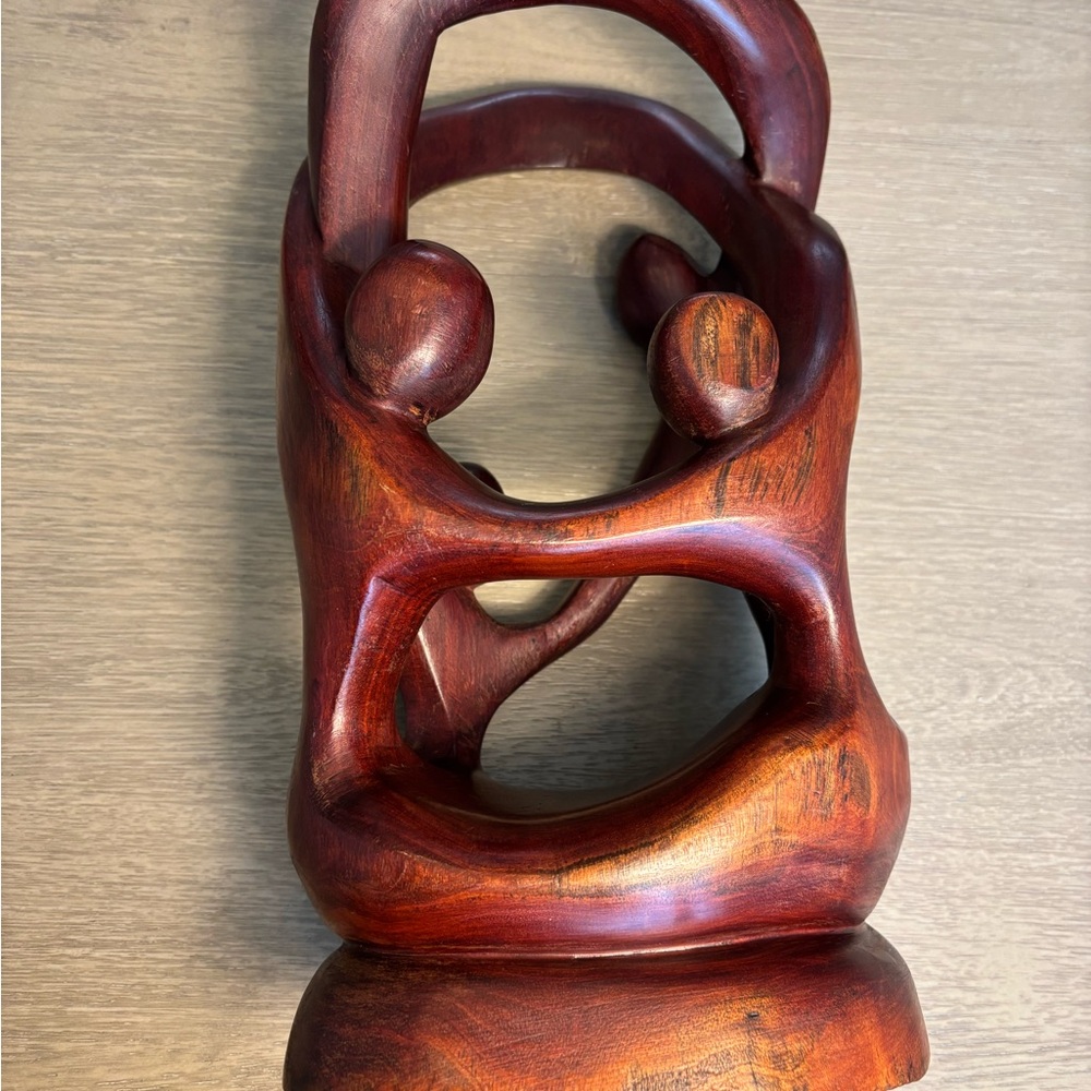 Beautiful Brown Wooden Sculpture with Curved Lines and Abstract Form.